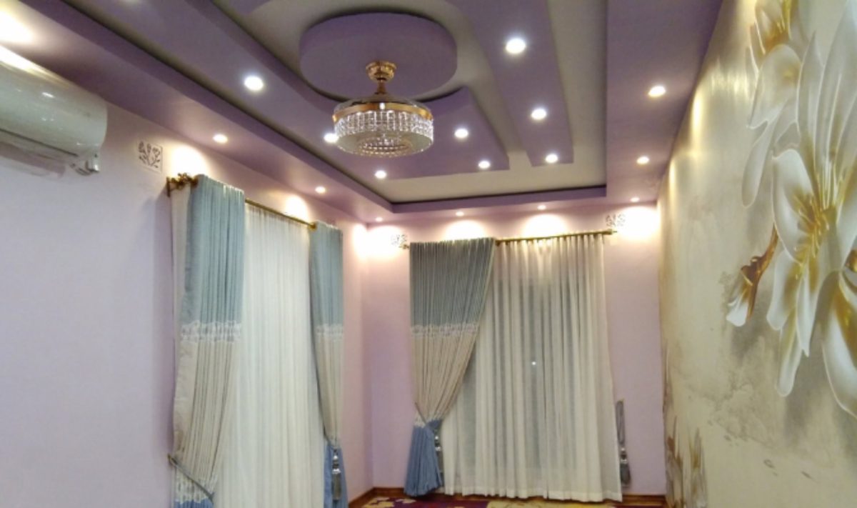 Layered curtains and sheers in a lounge